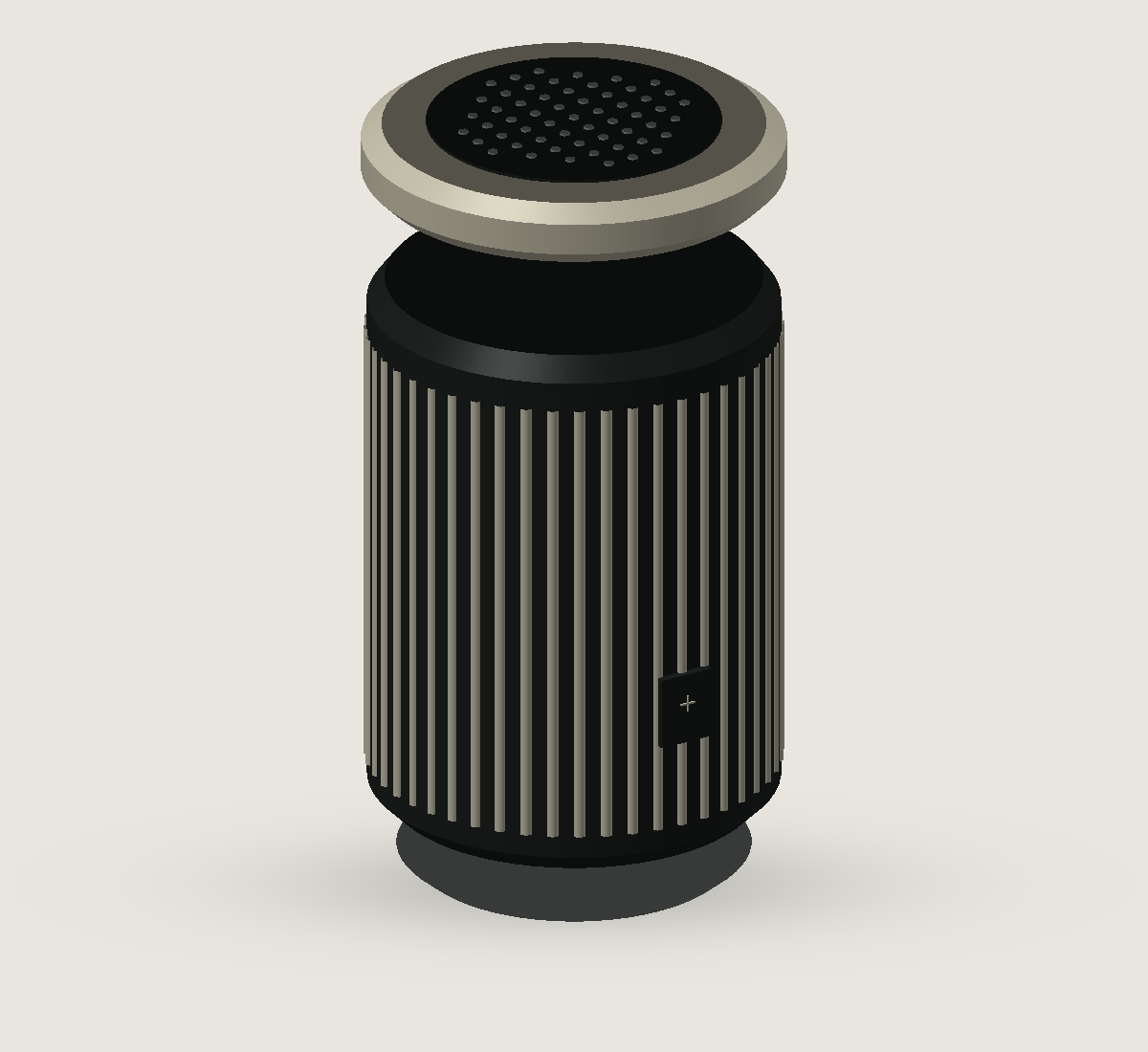 Terracottakleurige cilindervormige speaker met verticale ribben en een donkere geperforeerde bovenkant. Alternatief standpunt en materiaal.